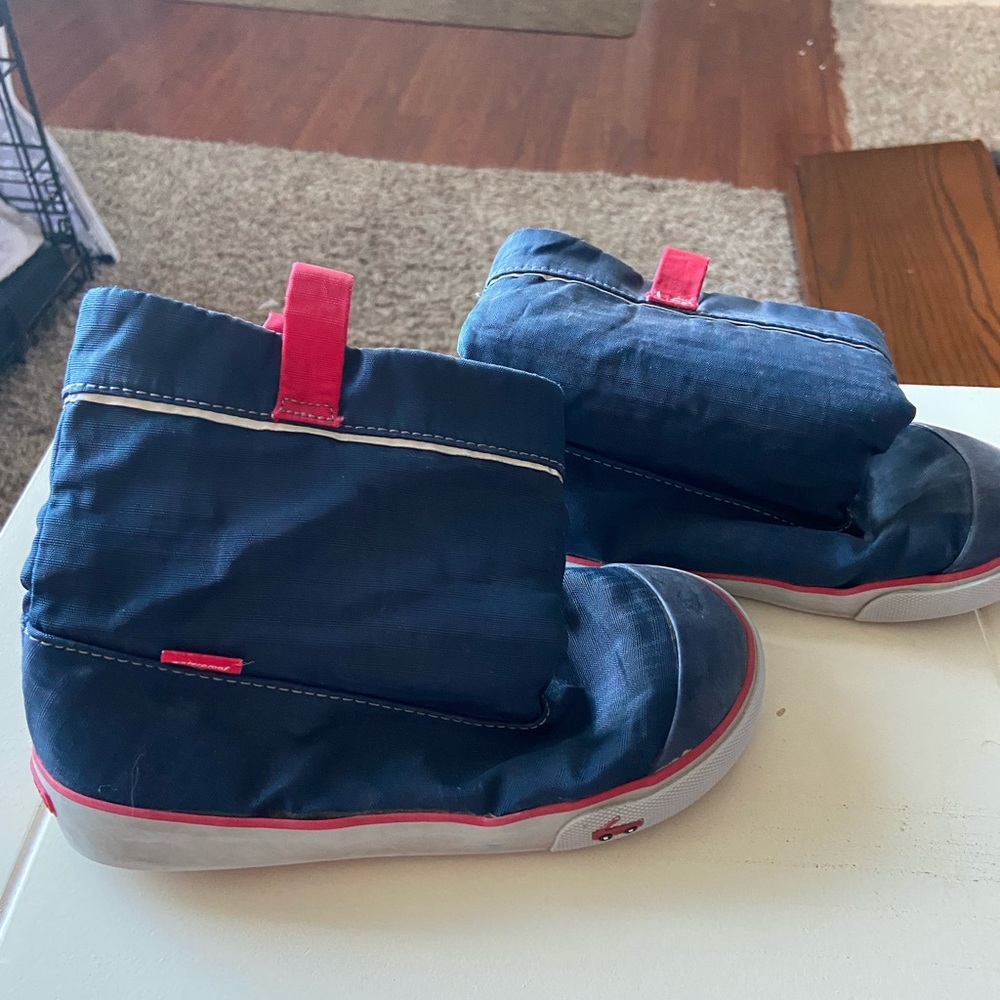 See Kai Run pull on boys water proof boots.